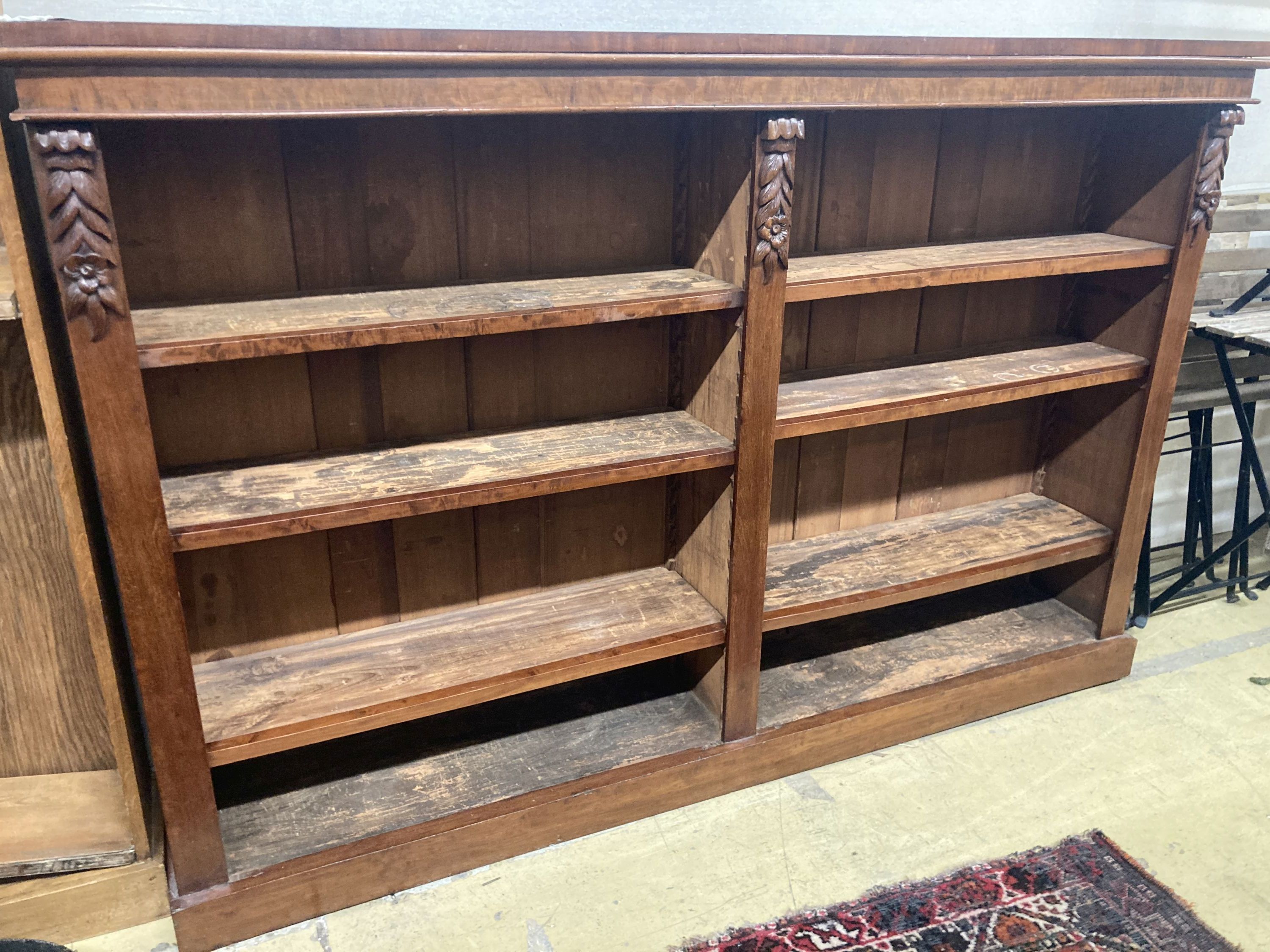 A late Victorian banded mahogany open bookcase, length 183cm, depth 33cm, height 123cm